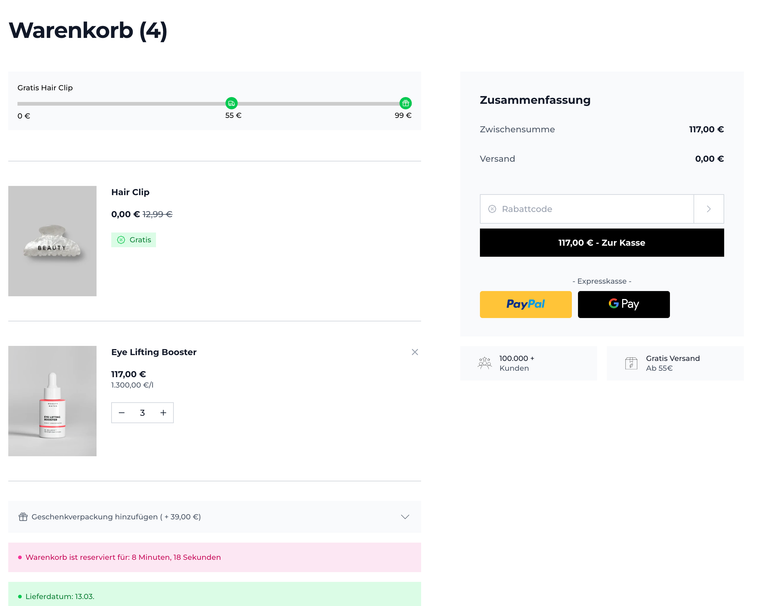 Shopify-Warenkorbseite mit Fortschrittsbalken für Gratisversand, kostenloser Zugabe, Rabattcode-Feld und Express-Checkout-Buttons